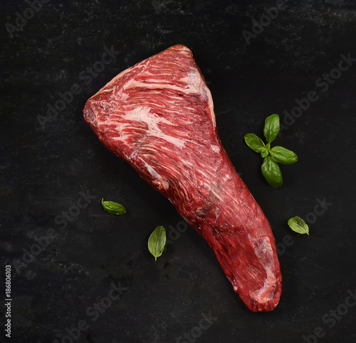 raw beef steak marble on a black background