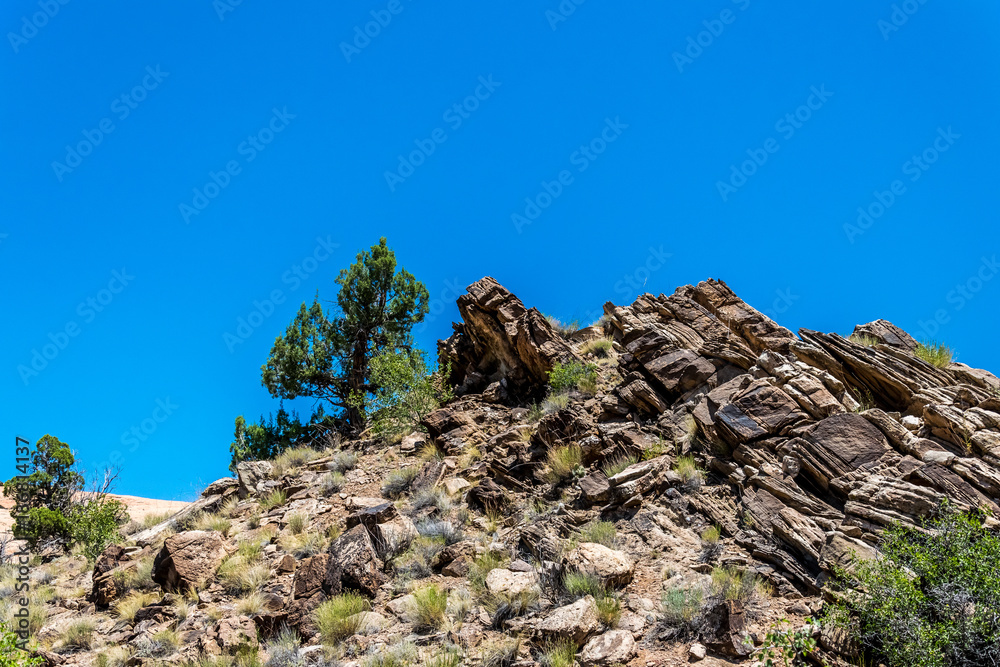 Desert Moab, Utah, USA. Weathering sandstone cliffs. Rocks and sky