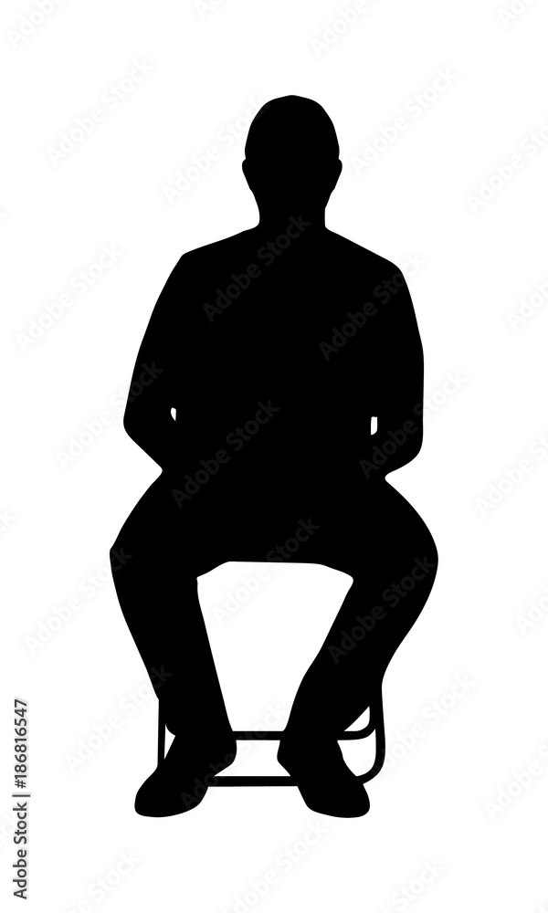 Silhouette of a sitting man on chair