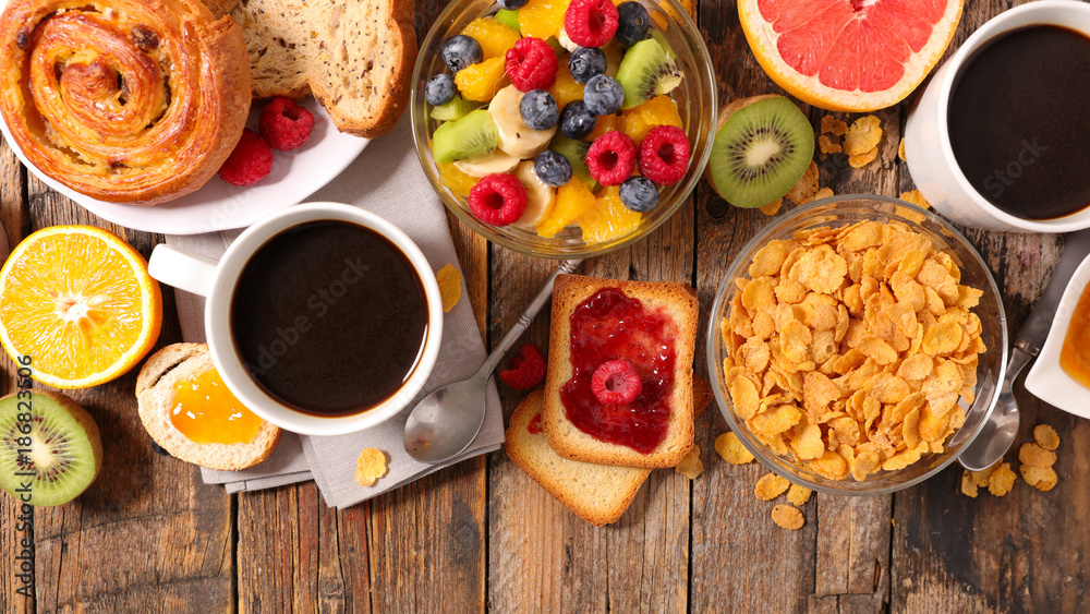 breakfast with coffee,croissant,fruit breakfast with coffee,croissant,fruit