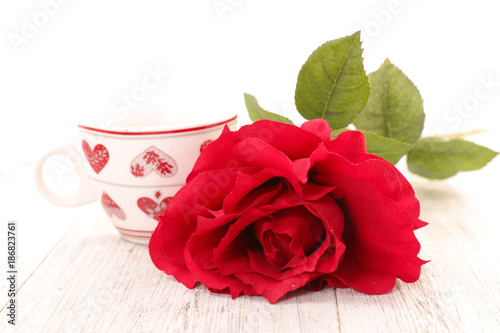 coffee cup and red rose