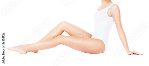 Close-up of a girl with perfect body in underwear isolated on white. Healthcare  sport  fitness  depilation  cellulite and hair removal  healthy life-style concept.