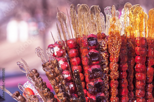 Tanghulu, Chinese candied fruit on the stick, Chinese food photo