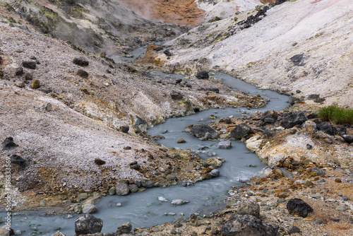Small river streams through the rocks of Hell Valley (Jigokudani), Noboribetsu, Hokkaido, Japan
