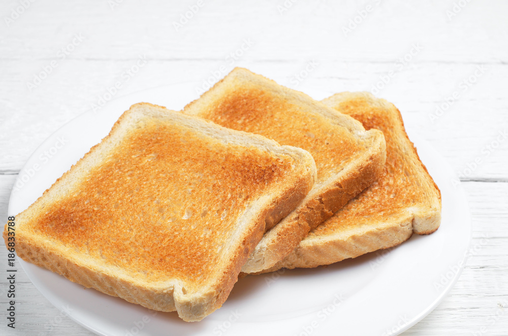 Slices of toast bread - obrazy, fototapety, plakaty 