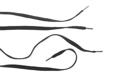 Black shoelaces isolated on white background, top view