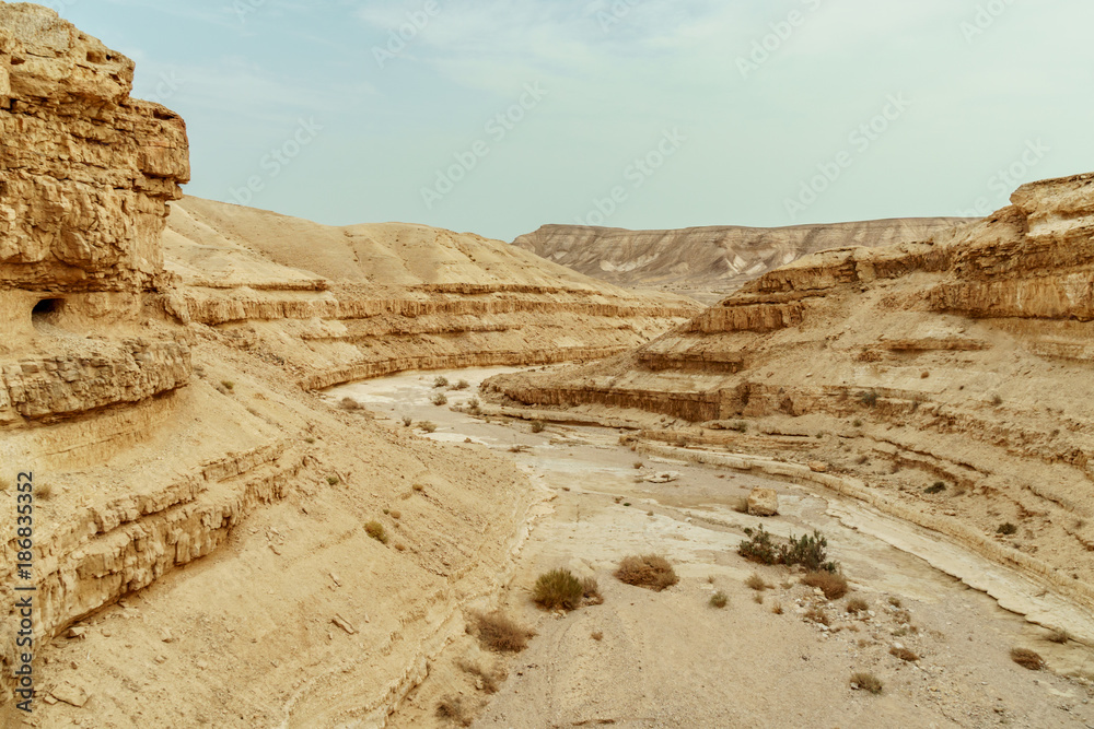 View on judean desert mountains, rocks and sky near the dead sea in Israel View on judean desert mountains, rocks and sky near the dead sea in Israel