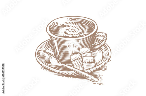Cup of coffee with sugar and teaspoon