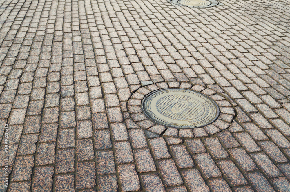 The pavement is tiled. The pavement is tiled.