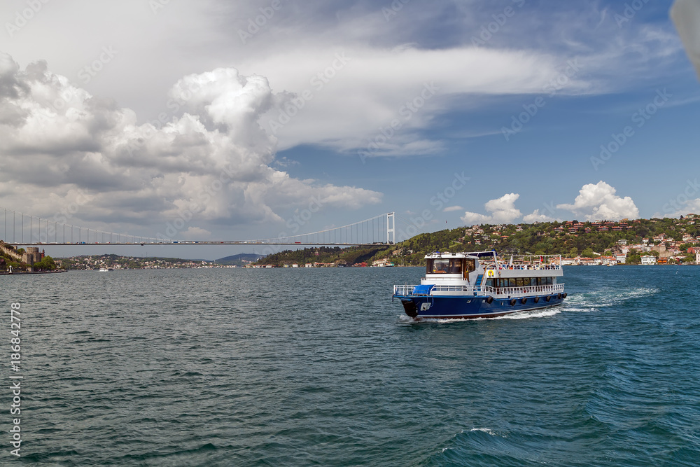 Ferry passenger boat on the Gulf Golden Horn, Channel Bosphorus Strait Sea front landscape of Istanbul historical part, Turkey famous city.