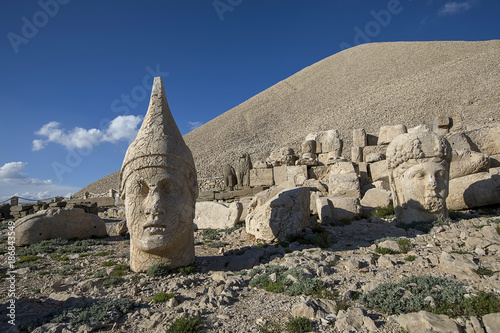 Toppled heads of the gods on East terrace at the top of Nemrut dagi in Turkey. The UNESCO World Heritage Site at Mount Nemrut where King Antiochus is reputedly entombed.