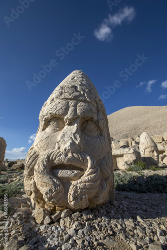 Toppled heads of the gods on East terrace at the top of Nemrut dagi in Turkey. The UNESCO World Heritage Site at Mount Nemrut where King Antiochus is reputedly entombed.