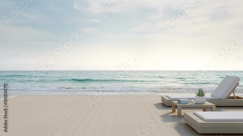 Sea view terrace and beds in modern luxury beach house with blue sky background, Lounge chairs on wooden deck at vacation home or hotel - 3d rendering of tourist resort