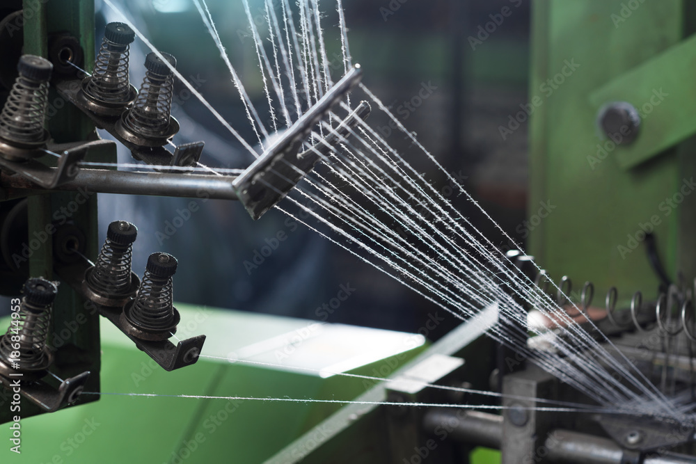 Label weaving machine, A loom machine for clothing or woven label