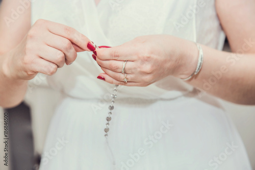 Bride prepare herself to the wedding ceremony