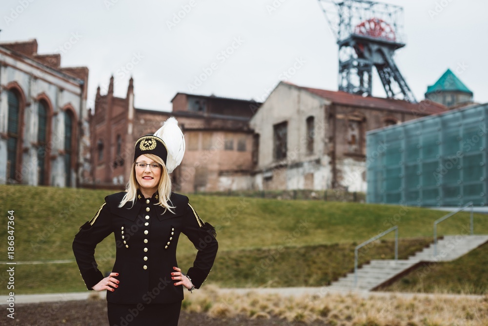 Working woman miner in gala parade uniform.