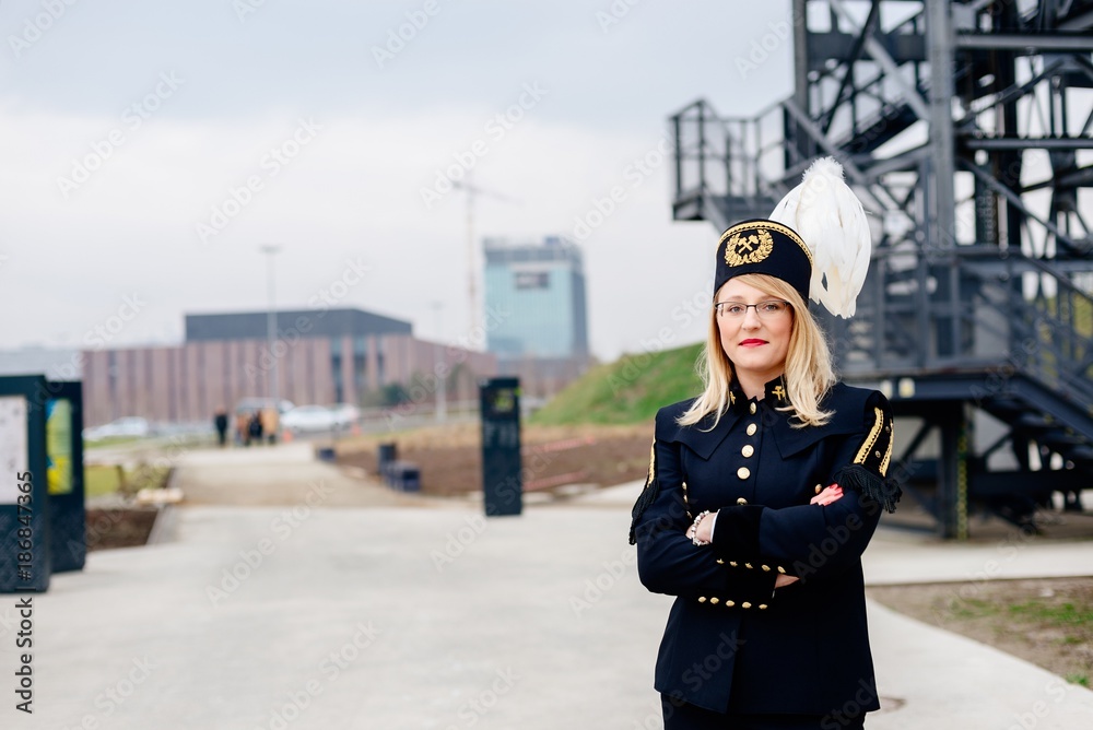 Working woman miner in gala parade uniform.