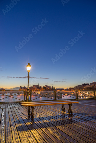 River Seine with Pont des Arts at sunrise in Paris