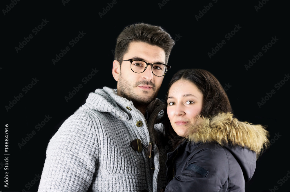 portrait of beautiful young couple in winter clothes portrait of beautiful young couple in winter clothes