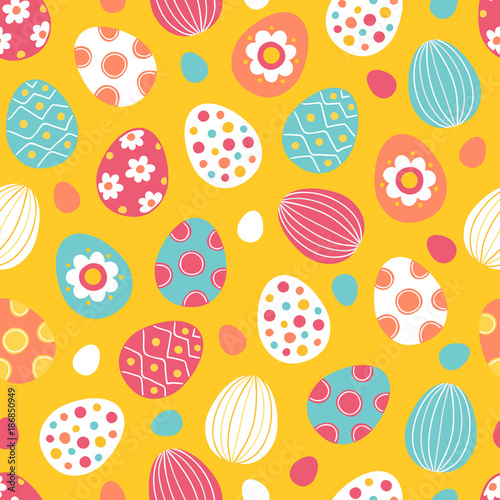 Easter seamless pattern with colorful eggs on yellow background