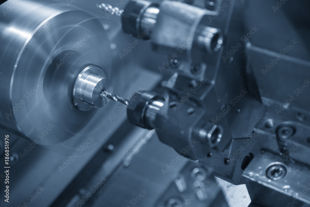 The small CNC lathe multi function for hi-precision manufacturing.The brass rod part machining process. The small CNC lathe multi function for hi-precision manufacturing.The brass rod part machining process.