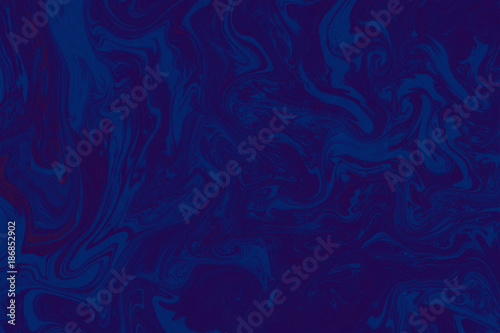 Suminagashi marble texture hand painted with indigo ink. Digital paper 1290 performed in traditional japanese suminagashi floating ink technique. Energetic liquid abstract background. photo