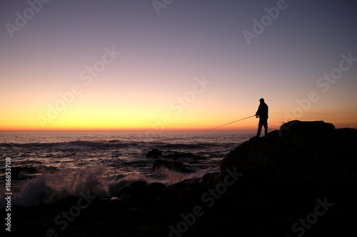 fisherman at sunset © robypangy