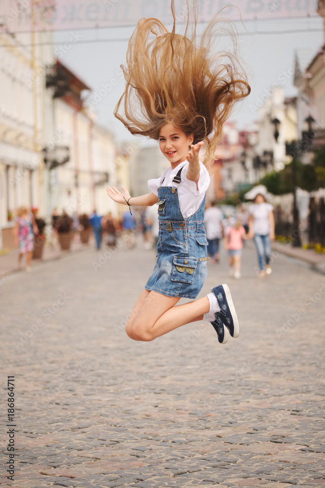 Fototapeta premium beautiful young girl with long hair