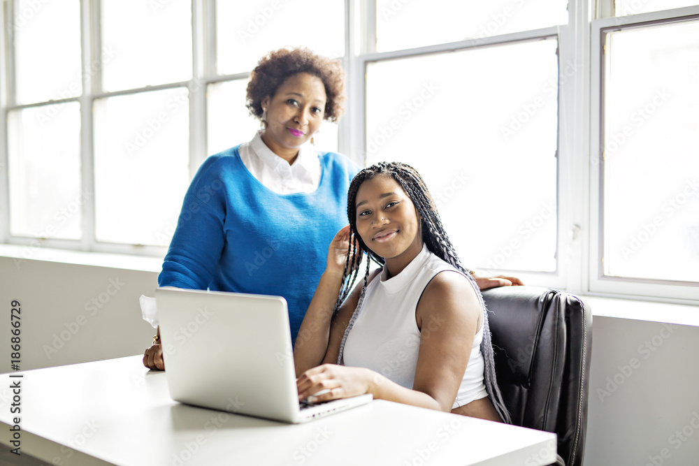 Mother And Teenage Daughter with Laptop Together Mother And Teenage Daughter with Laptop Together