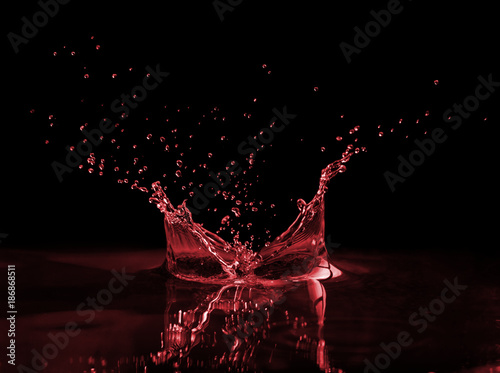 Red splash on a black photo