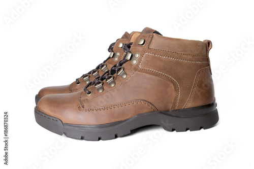 Male brown leather boot on white background, isolated product, comfortable footwear.