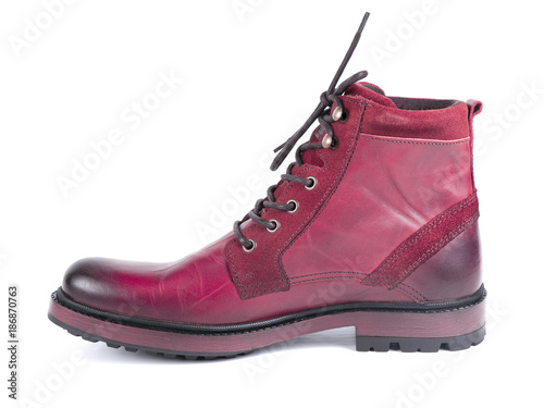 Female pink leather boot on white background, isolated product, comfortable footwear. © GeorgeVieiraSilva