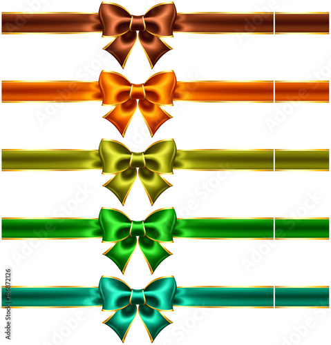 Holiday bows with gold edging and ribbons