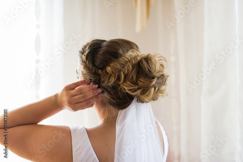 Beautiful air wedding hairstyle view from the back