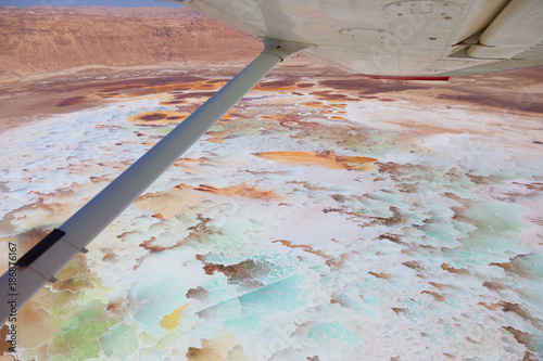 Aerial view of the Dead Sea salt pools and Ein boqeq photo