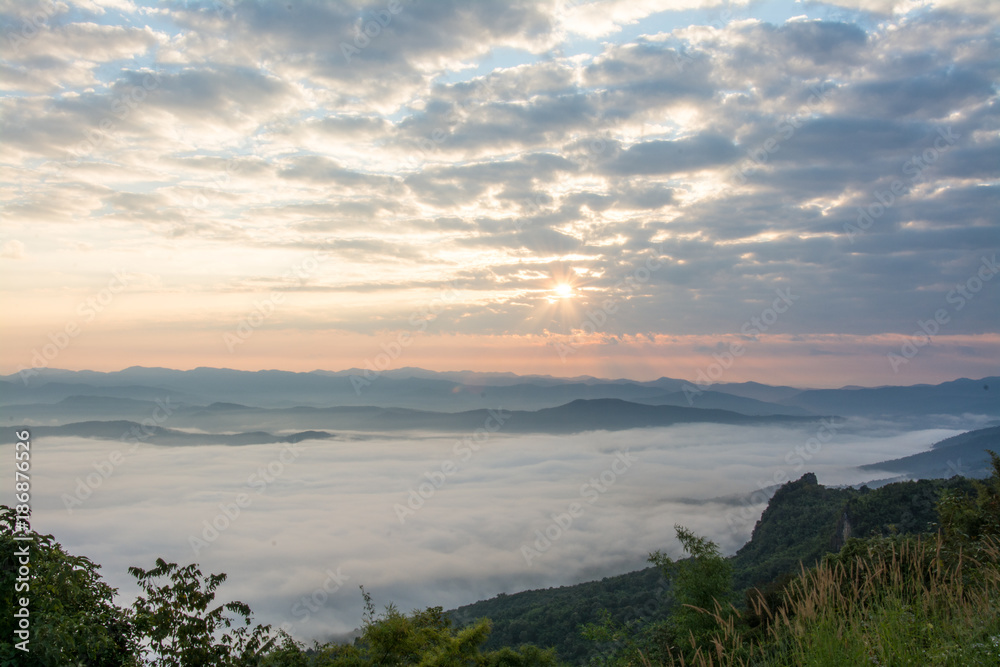 sunrise twilight and sea fog of Doi Samer Dao  in Sri Nan National Park ,  Nan Province of Thailand