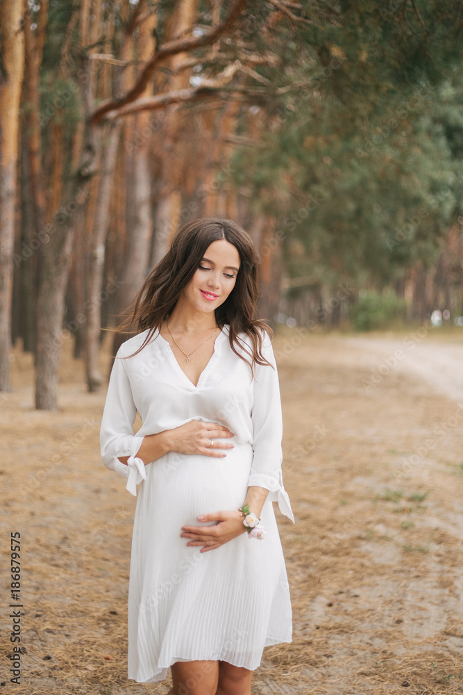 Pregnant woman, relax and enjoy life in nature Pregnant woman, relax and enjoy life in nature