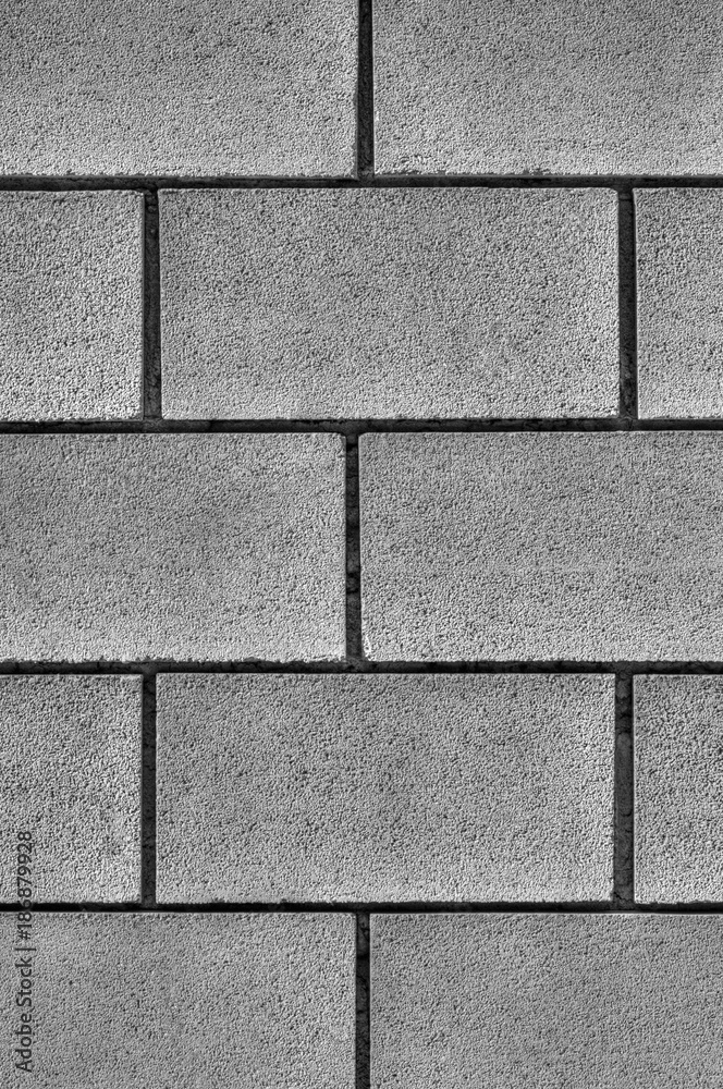 Fototapeta premium Stylish stone wall background in black and white