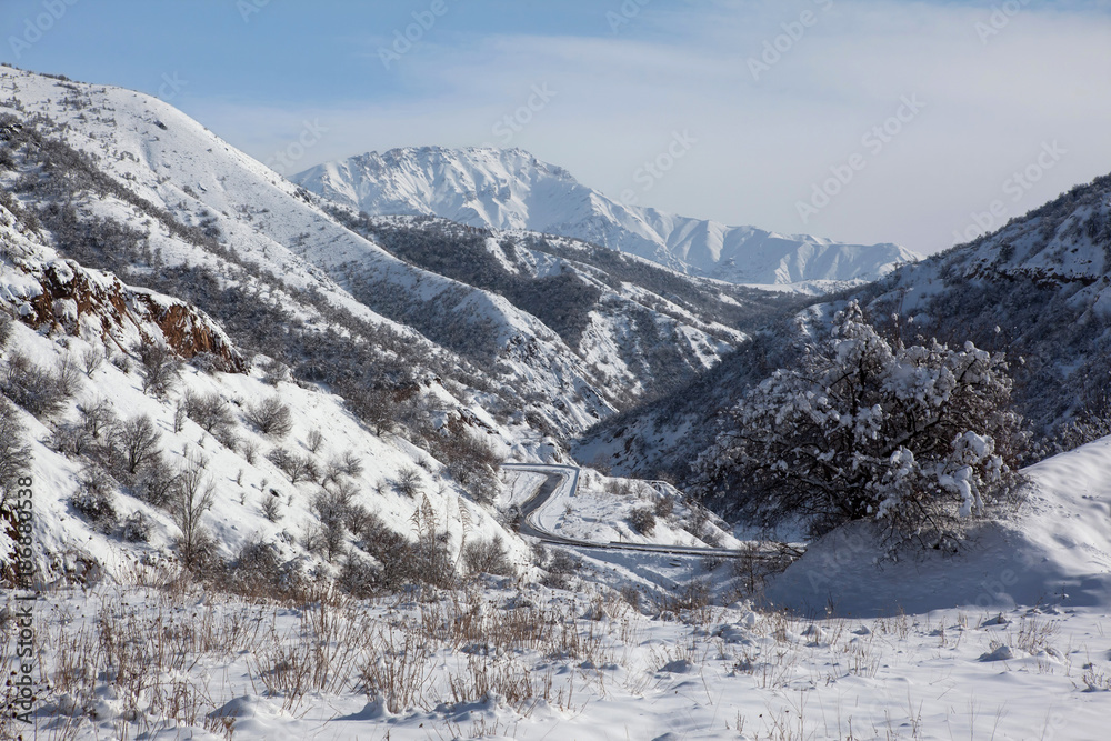 Snowy mountains,Sunny day.Uzbekistan.
