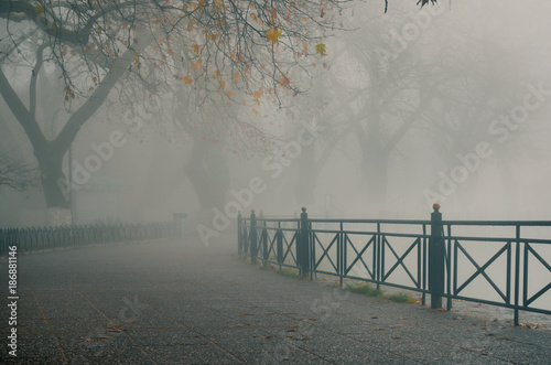foggy day in Ioannina with pamvotida lake covered in dense fog.Typical wintry scenery. Ioannina is the absolute winter destination for holidays.