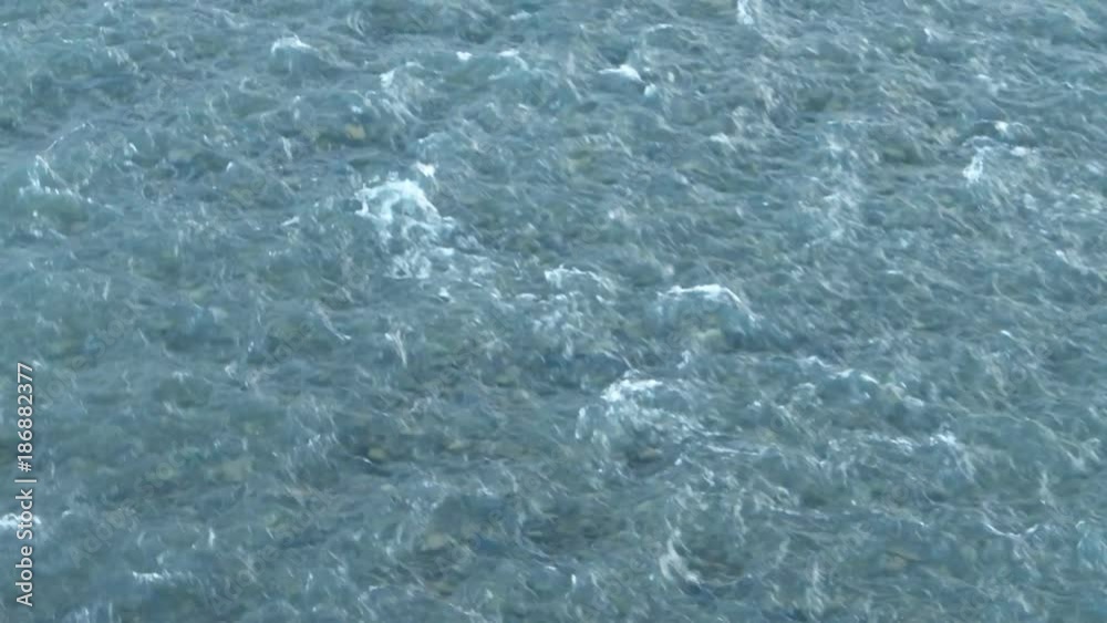 Water surface of the mountain river Water surface of the mountain river