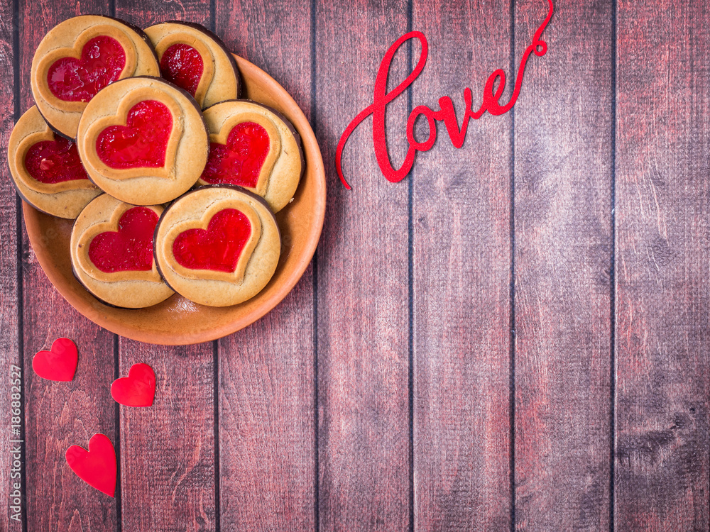 Homemade Cookies with a Red Jam Heart Valentine's Day Dark Wooden Background Copy Space