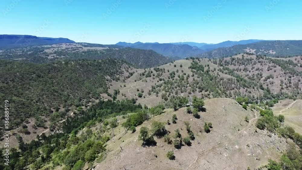 Wide aerial, vast mountain ridges in Australia Wide aerial, vast mountain ridges in Australia