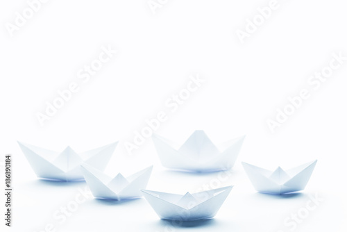 Fototapeta Naklejka Na Ścianę i Meble -  paper boats on a white matte background