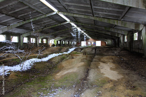 Old destroyed by time and vandals industrial building of the times of the USSR. December 2017