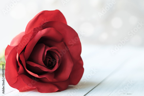 Red roses on wooden background Valentines day celebration