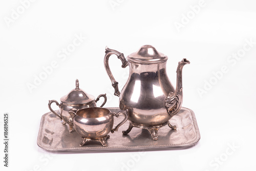 art deco silver sugar bowl and teapot on a tray