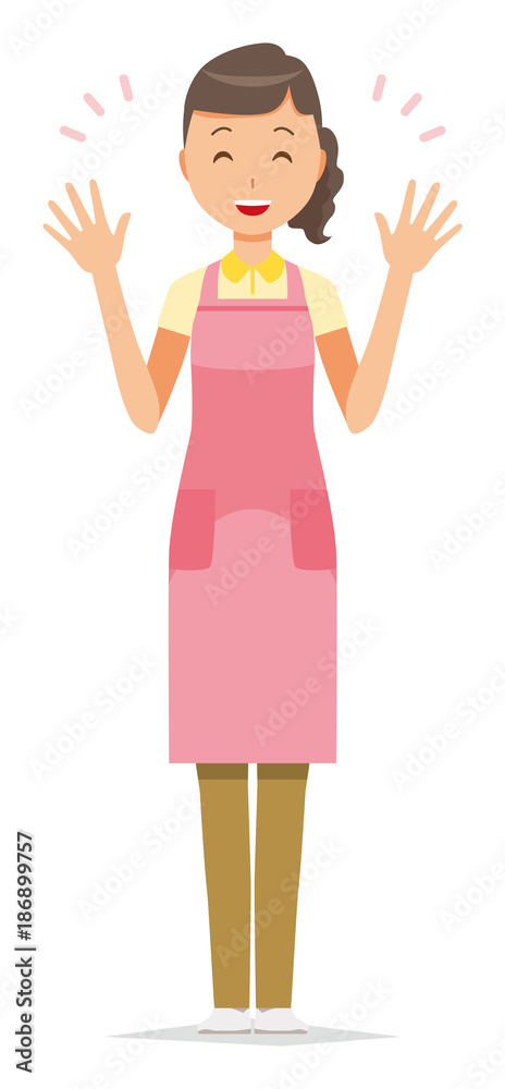 A female home helper wearing an apron has spread both hands A female home helper wearing an apron has spread both hands