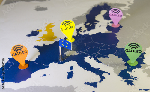 Toy car, Galileo pin and a smartphone Over a EU map.Symbolizing the European Galileo Global Satellite Navigation System GNSS.In April 2018,all new vehicles sold in Europe will be Galileo capable photo