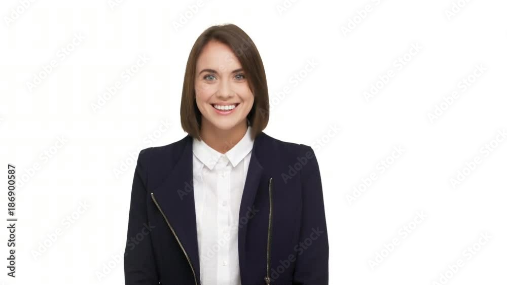 portrait of lovely businesswoman with short dark hair in formal wear being happy at work smiling on camera showing perfect teeth over white background. Concept of emotions portrait of lovely businesswoman with short dark hair in formal wear being happy at work smiling on camera showing perfect teeth over white background. Concept of emotions